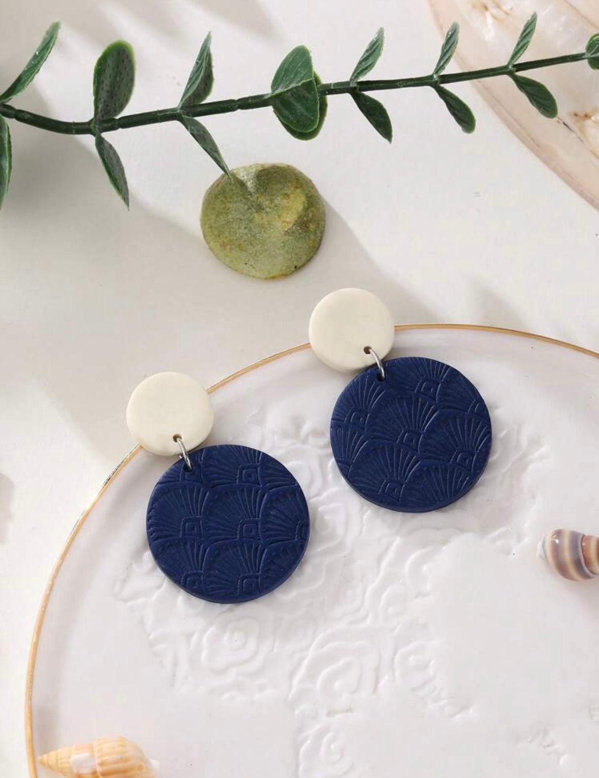 Cream and navy earrings